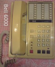 Телефон кнопочный стационарный.