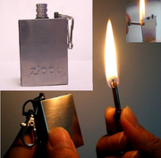 Зажигалка в виде спички.