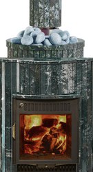Печь для бани в облицовке из натурального камня